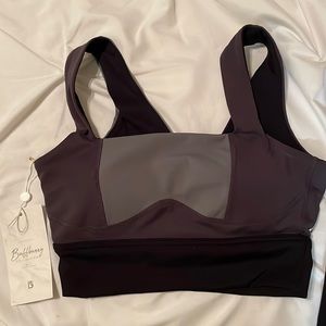 Buffbunny black and gray sports bra, size S, new with tags. Never worn